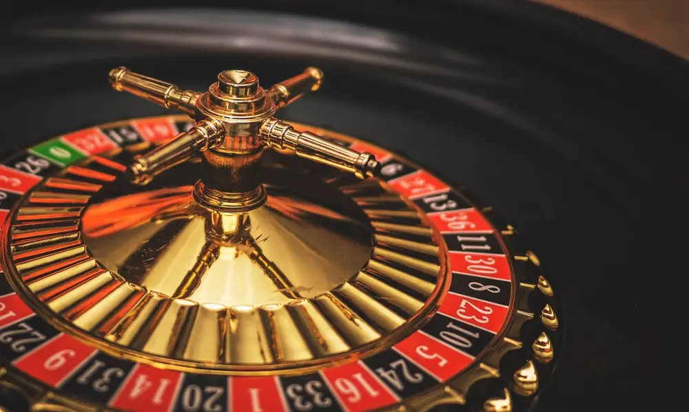 Close-up of a spinning roulette wheel with the ball in play